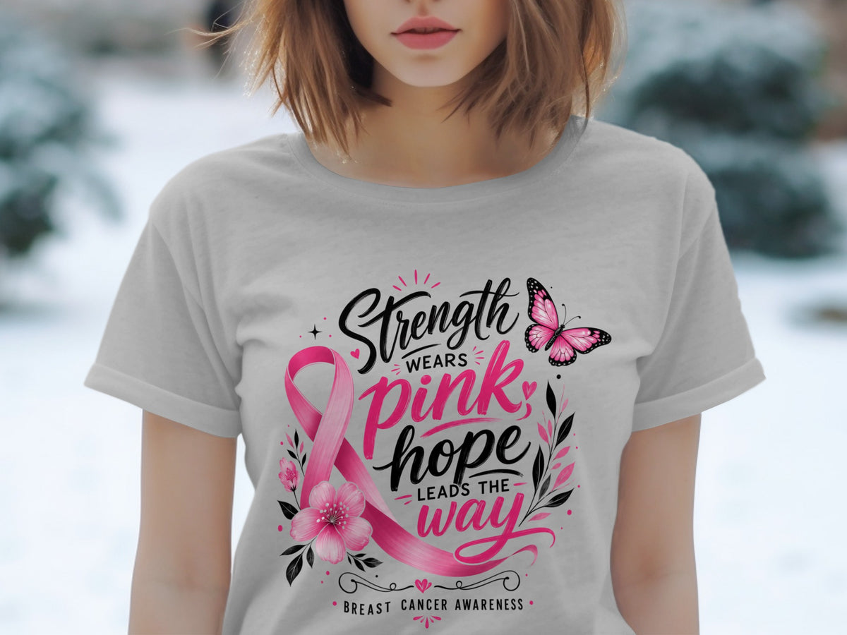 Gray t-shirt with pink ribbon, flowers, butterfly, and text "Strength Wears Pink, Hope Leads the Way"