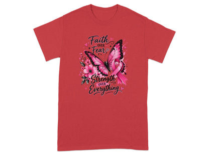 Red t-shirt with butterfly, flowers, pink ribbon, and text "Faith Over Fear" and "Strength Over Everything".