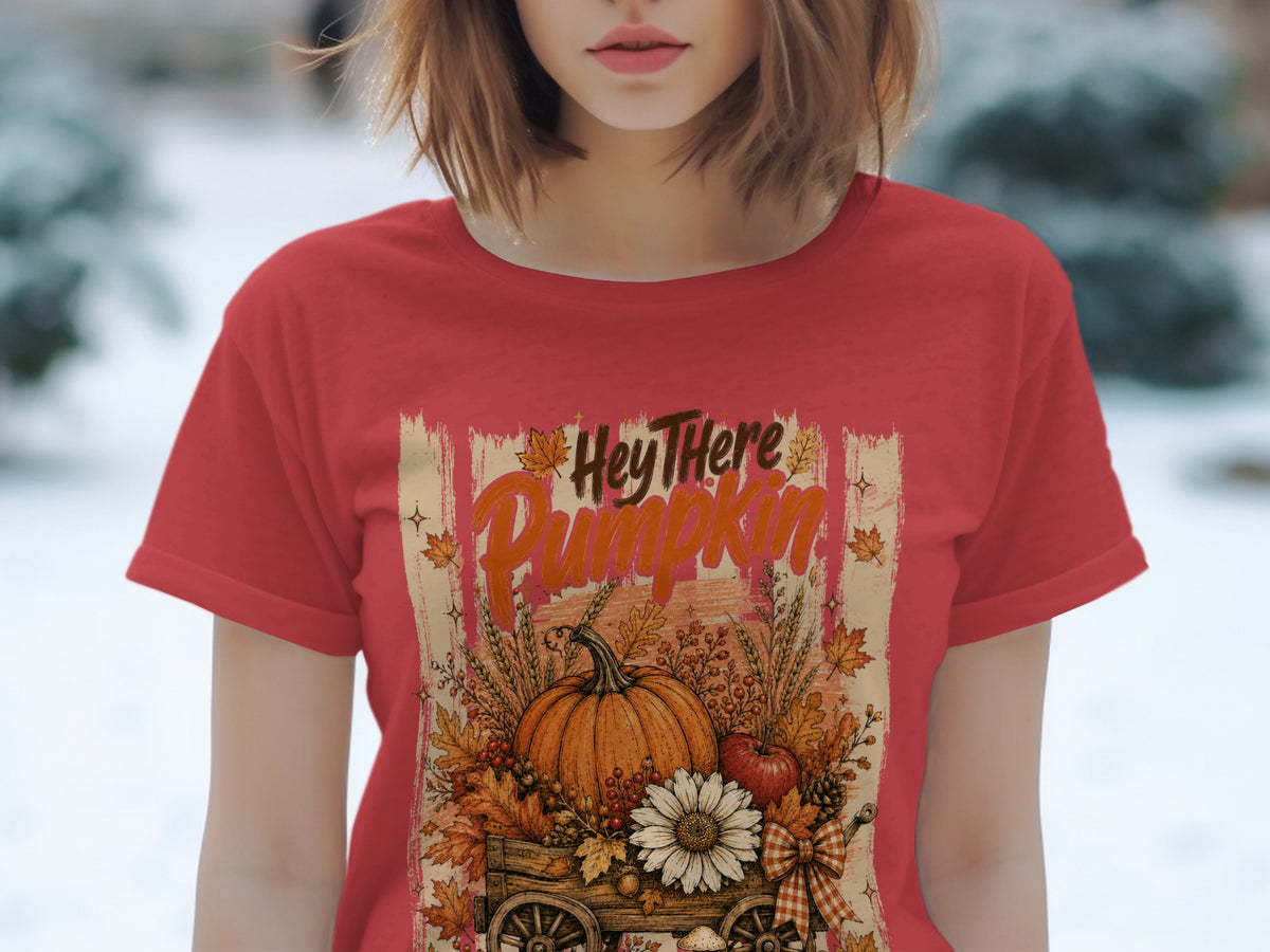 Red t-shirt with "Hey There Pumpkin" text and fall harvest wagon graphic.