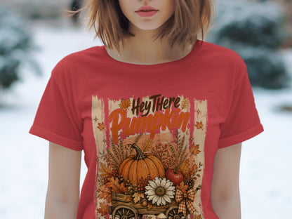 Red t-shirt with "Hey There Pumpkin" text and fall harvest wagon graphic.