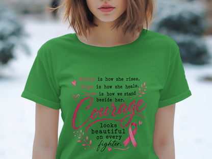 Green t-shirt with inspirational text and pink ribbon for breast cancer awareness.