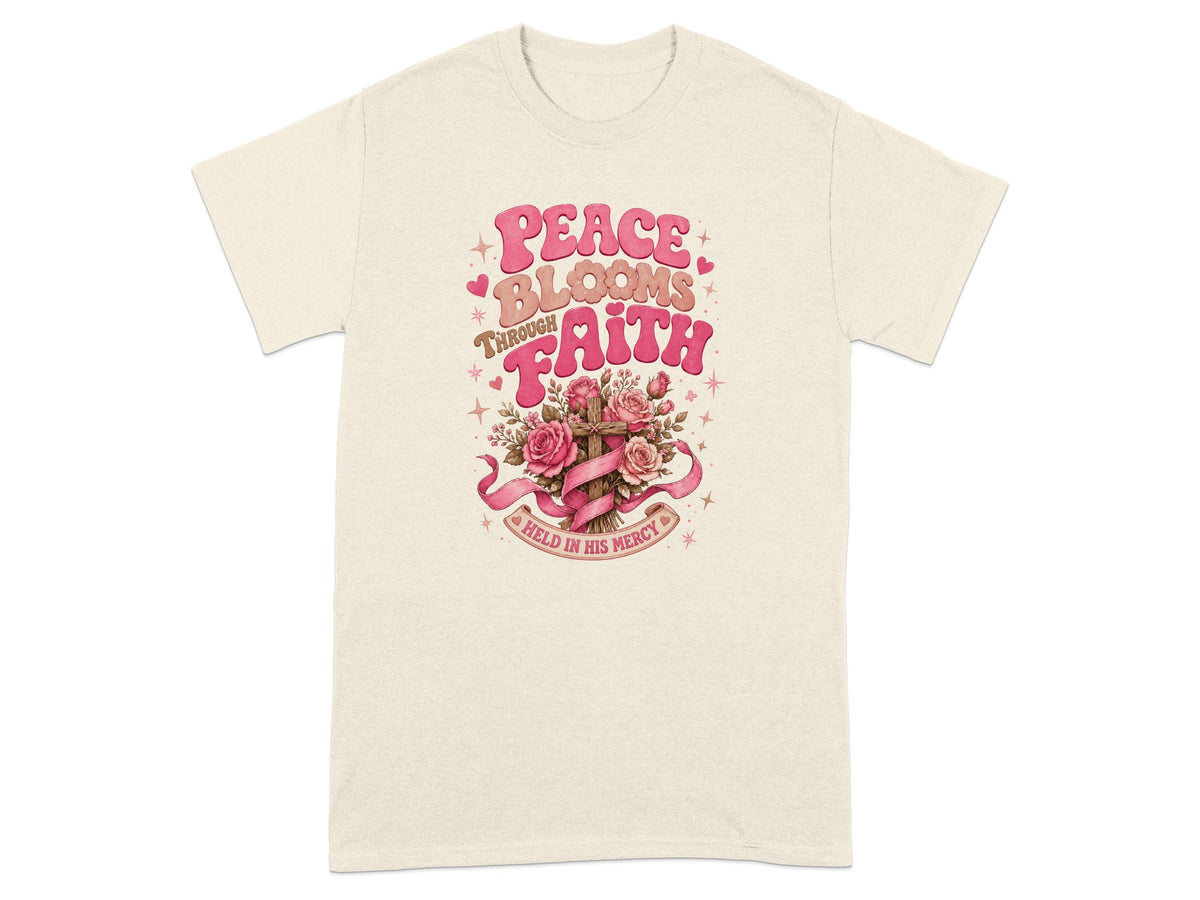 Cream t-shirt with "Peace Blooms Through Faith Held in His Mercy" text and floral cross.