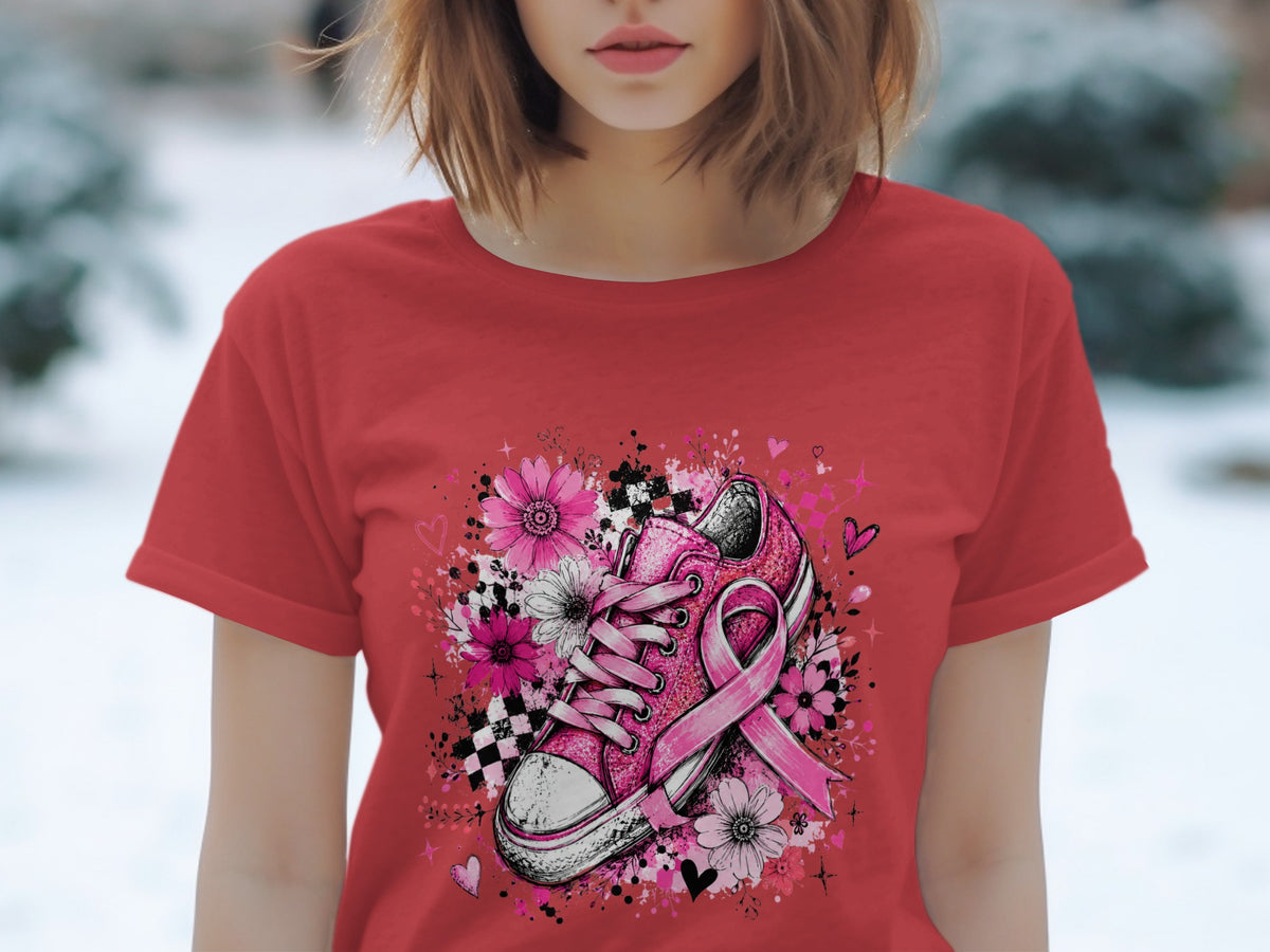Red t-shirt with pink glitter sneaker, flowers, ribbon, and hearts graphic.