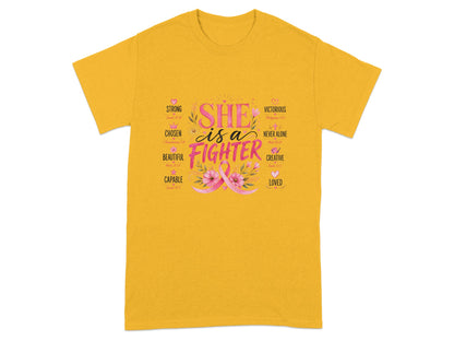 Yellow t-shirt with "SHE is a FIGHTER" and descriptive words.