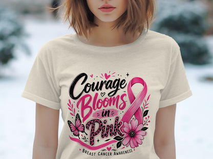 Cream t-shirt with "Courage Blooms in Pink" and breast cancer awareness ribbon.