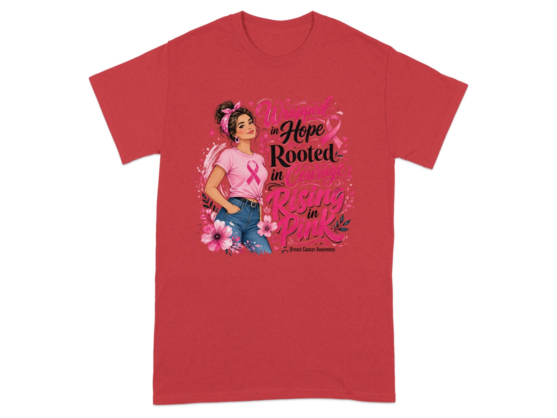 Red t-shirt with illustration "Wrapped in Hope Rooted in Courage Rising in Pink" and breast cancer awareness ribbon.