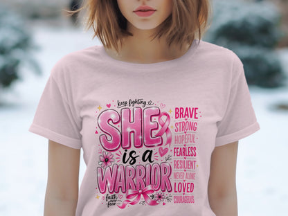 Pink t-shirt with "SHE is a WARRIOR" and words of encouragement.