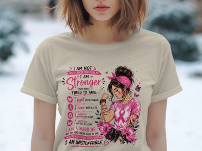 T-shirt with woman illustration and text about strength and fighting cancer.