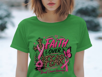Green t-shirt with "Faith Over Fear" and breast cancer awareness design.