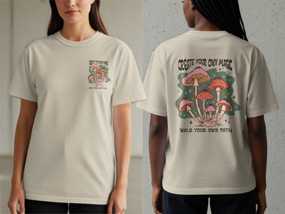 T-shirt with mushroom graphic and text "Create Your Own Magic, Walk Your Own Path."