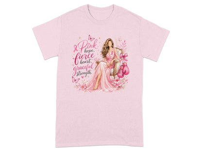 Pink t-shirt with woman, boxing gloves, and text: hope, fierce heart, graceful strength.