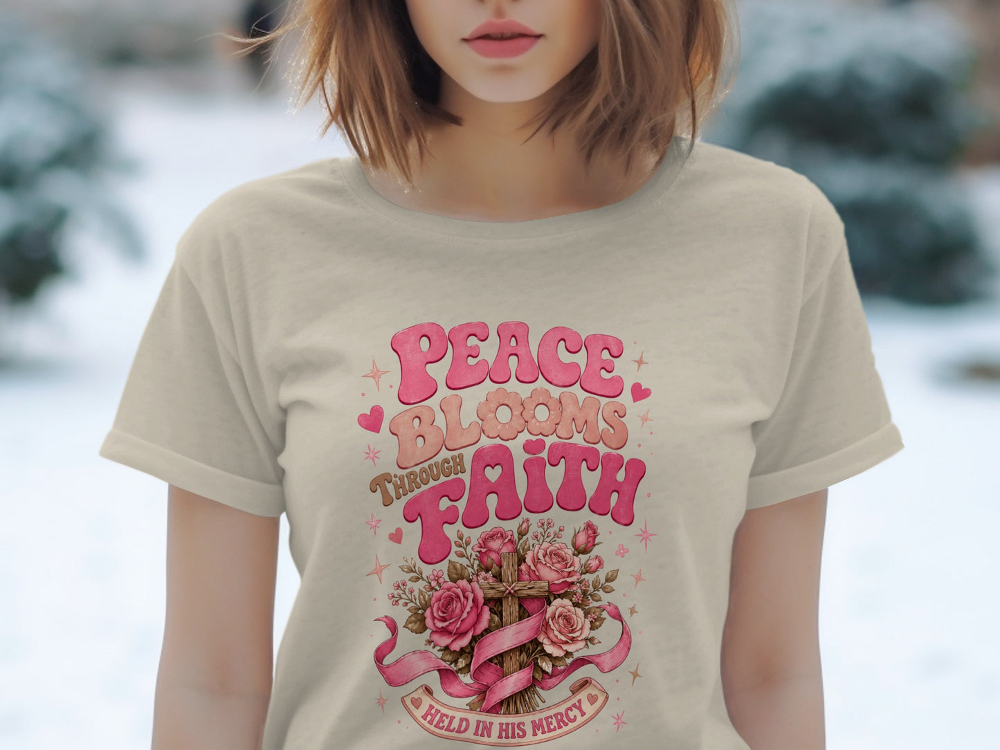 Cream t-shirt with "PEACE BLOOMS THROUGH FAITH" and religious cross graphic.