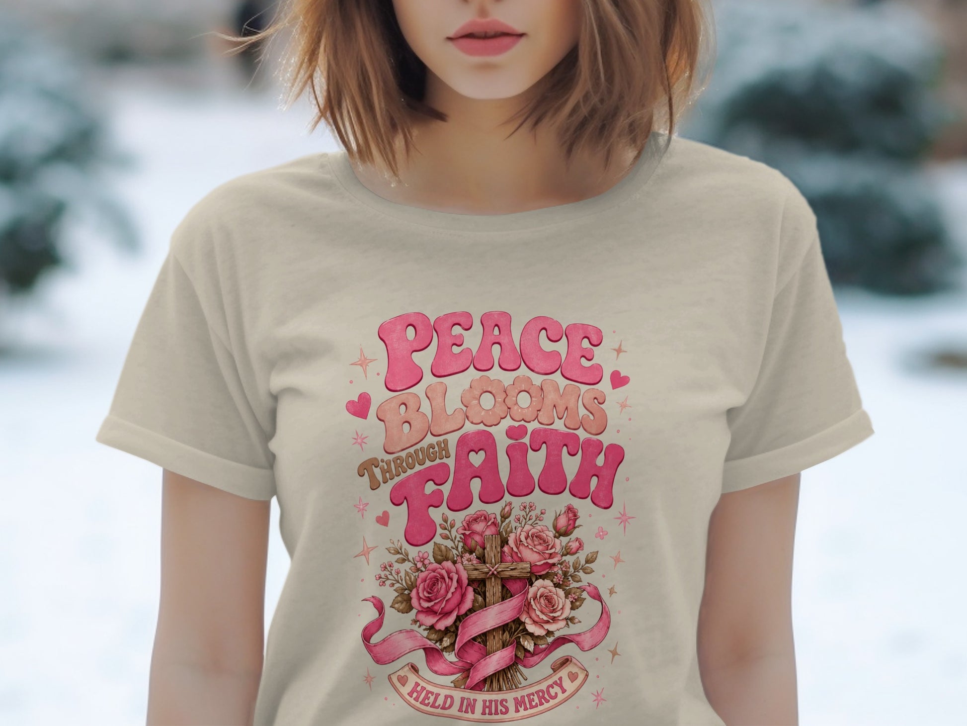 Cream t-shirt with "PEACE BLOOMS THROUGH FAITH" and religious cross graphic.
