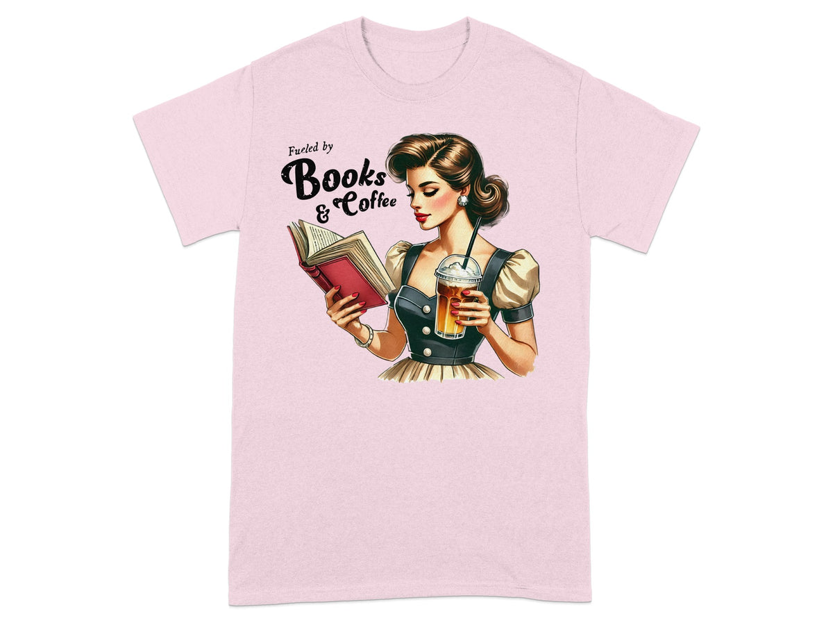 Pink t-shirt with illustration of woman reading book, holding coffee, text "Fueled by Books & Coffee".
