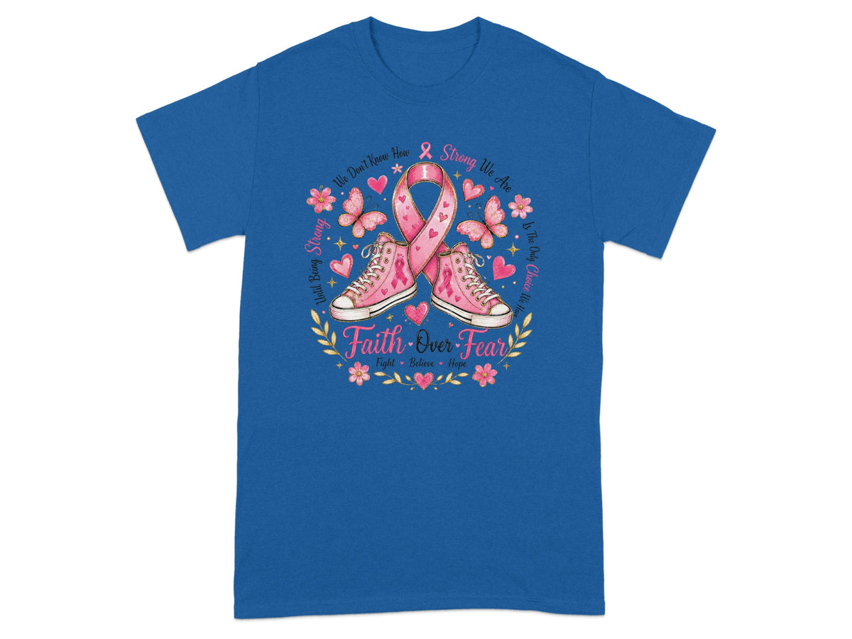 Blue t-shirt with pink ribbon, sneakers, butterflies, flowers, and text "Faith Over Fear."