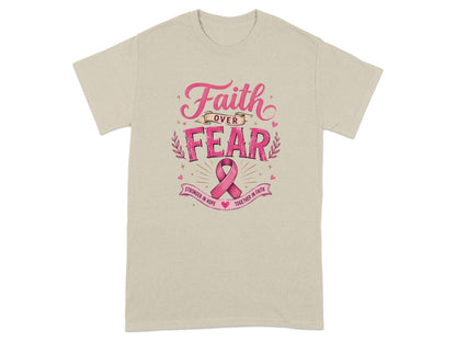 Tan t-shirt with "Faith over Fear" text and a pink ribbon.