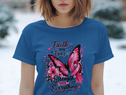 Blue t-shirt with pink butterfly, flowers, and "Faith Over Fear Strength Over Everything" text.