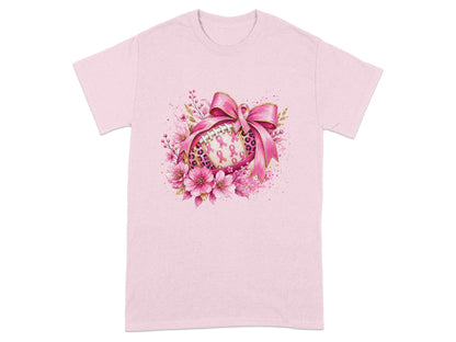 Pink t-shirt with a football decorated with pink ribbons and flowers.