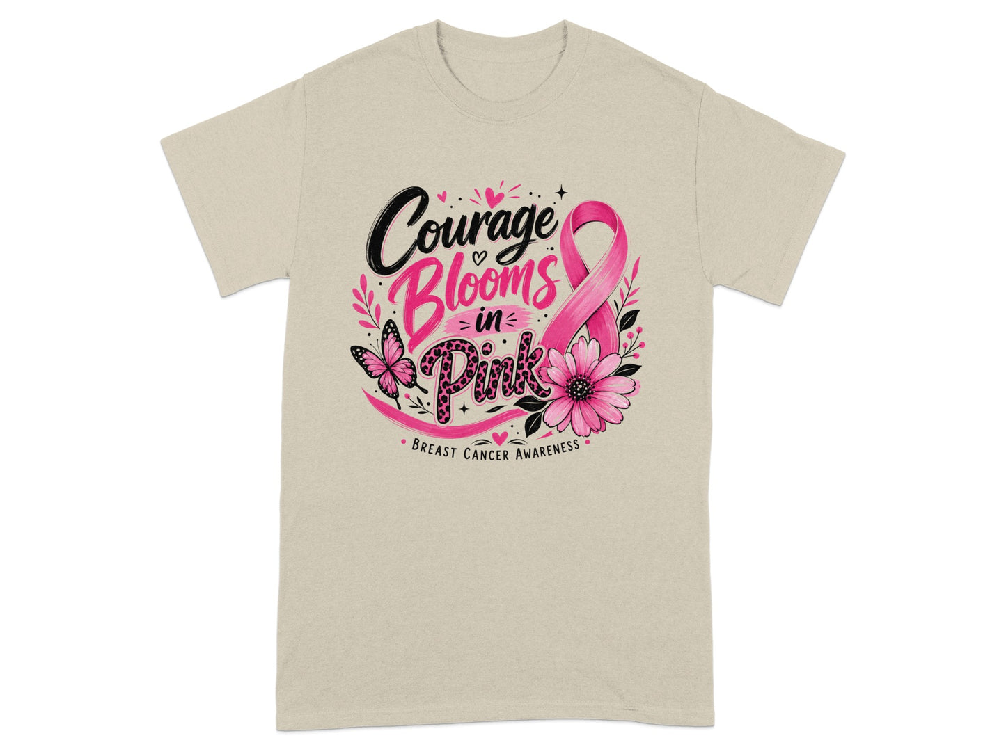 Light beige t-shirt with "Courage Blooms in Pink" Breast Cancer Awareness graphic.