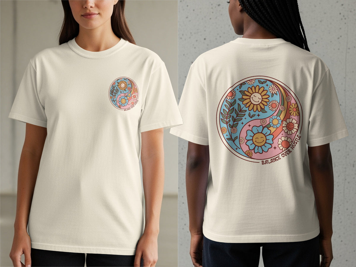 Cream t-shirt with floral yin yang graphic and "BALANCE OVER HUSTLE" text.