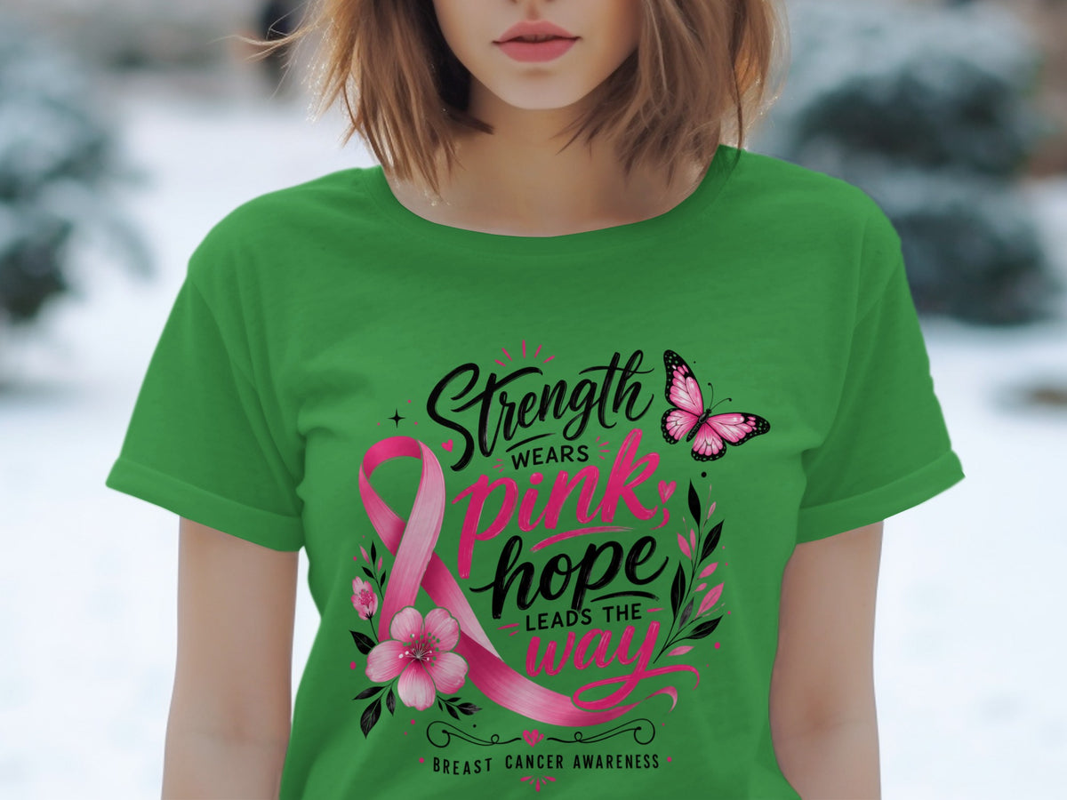 Green t-shirt with pink ribbon, butterfly, and text: "Strength wears pink; hope leads the way."