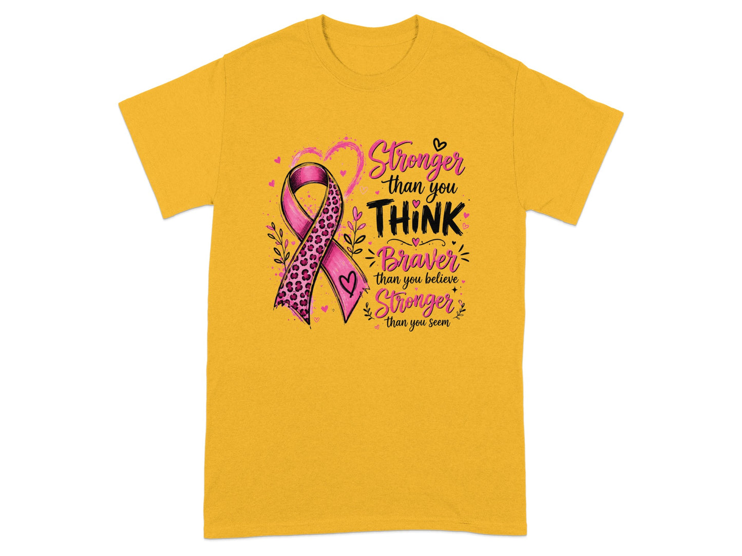 Yellow t-shirt with pink ribbon and "Stronger than you THINK, Braver than you believe, Stronger than you seem" text.