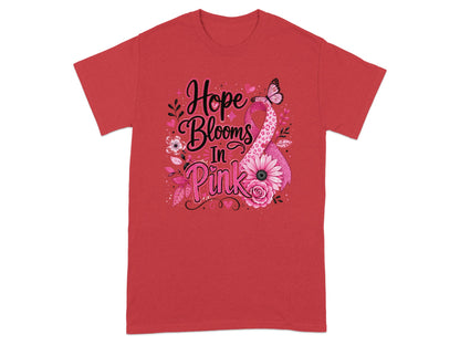 Red t-shirt with "Hope Blooms In Pink" text and breast cancer ribbon design.