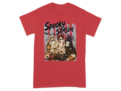 Spooky Season ghosts, pumpkins, and spell books with a cat on a red t-shirt.
