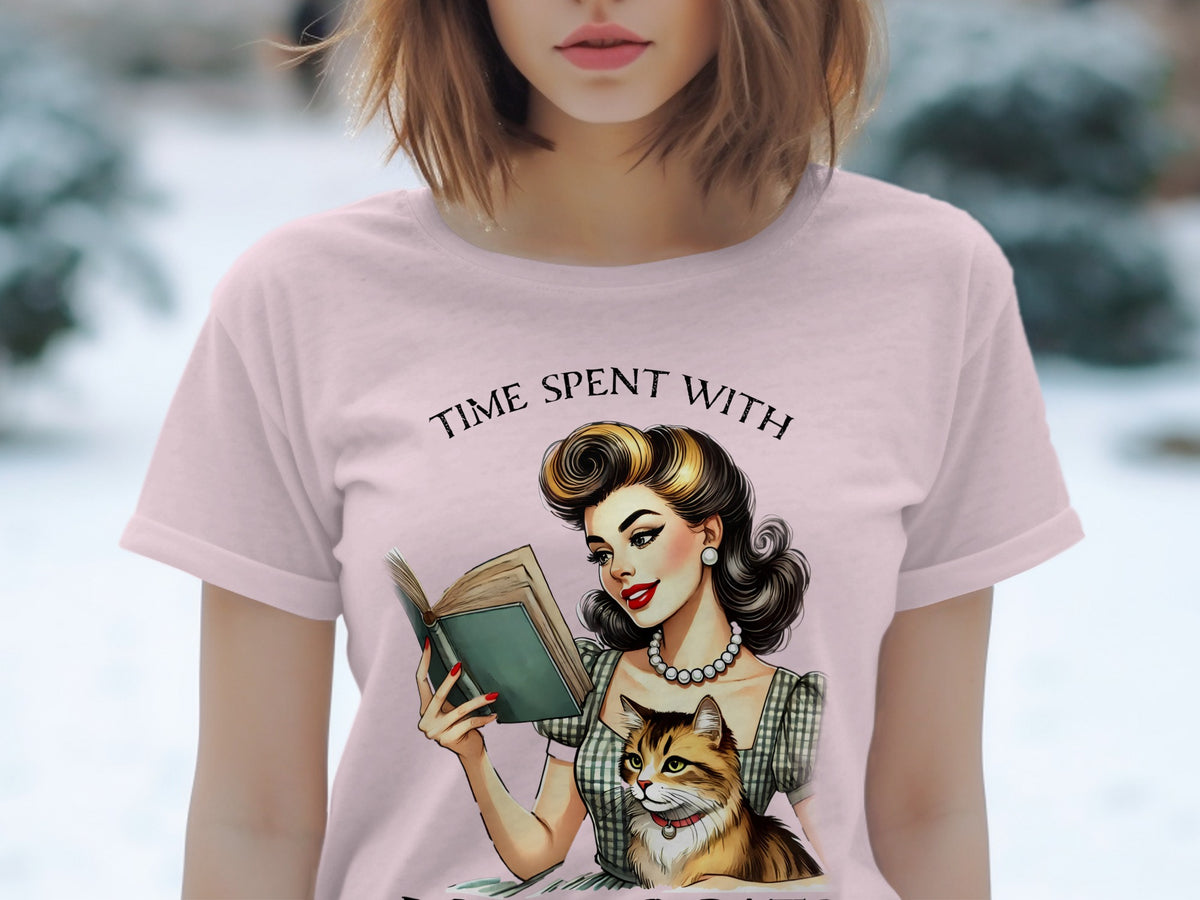 T-shirt with retro illustration of woman reading with cat and text "TIME SPENT WITH".