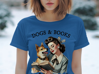 Blue t-shirt with "Dogs & Books" text and illustration of woman with dog reading.