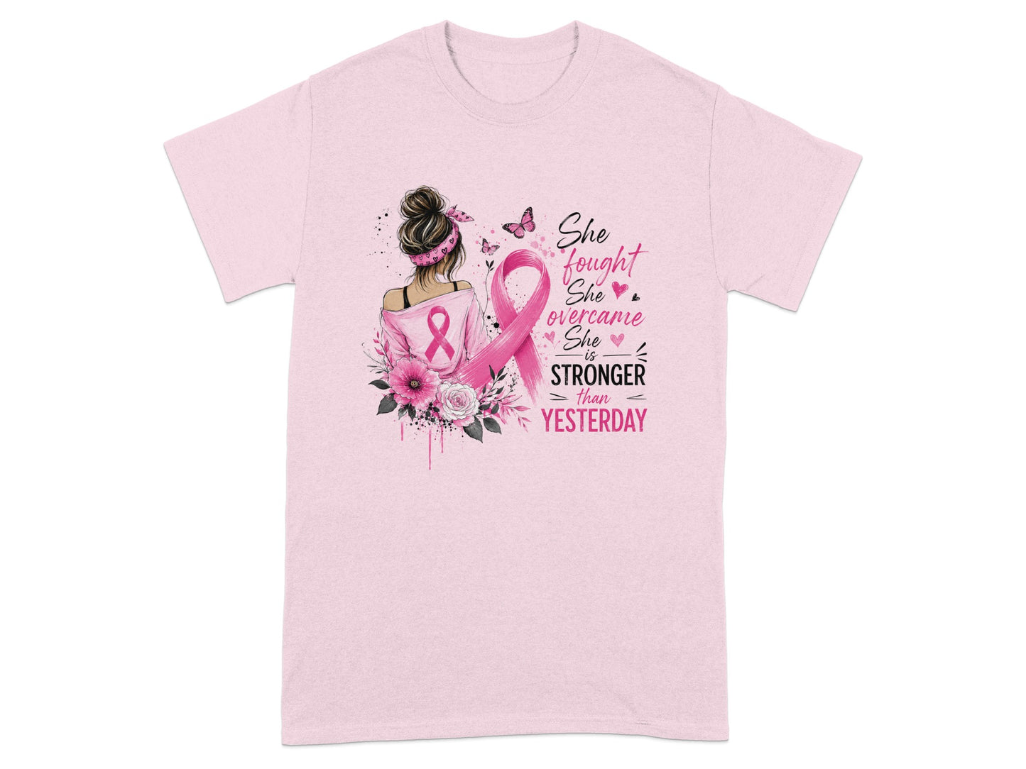 Pink t-shirt with a woman and pink ribbon, reading "She fought, She overcame, She is STRONGER THAN YESTERDAY".