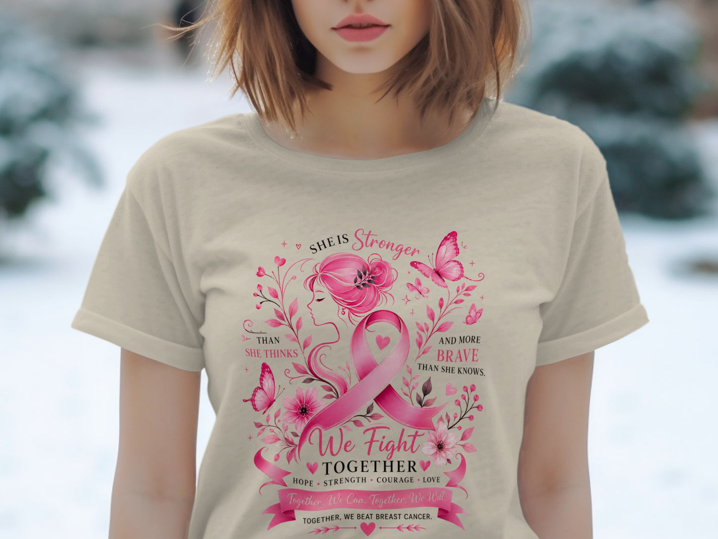 T-shirt with pink breast cancer ribbon, floral design, and empowering text.