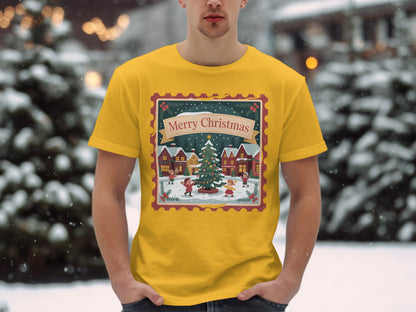 Yellow t-shirt with "Merry Christmas" stamp design featuring a winter village scene.