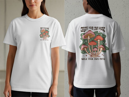 White t-shirt with "Create Your Own Magic" and mushroom graphic.