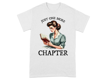 T-shirt with vintage illustration of a woman reading a book and text "Just One More Chapter".