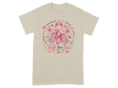 Faith Over Fear t-shirt with pink sneakers, ribbon, butterflies, and floral accents.