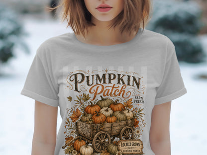 T-shirt graphic with "Pumpkin Patch" text and a wagon full of pumpkins.