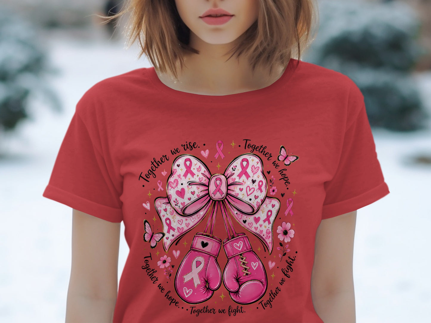 Red t-shirt with pink ribbon design featuring boxing gloves and butterflies with text "Together we rise. Together we hope. Together we fight."