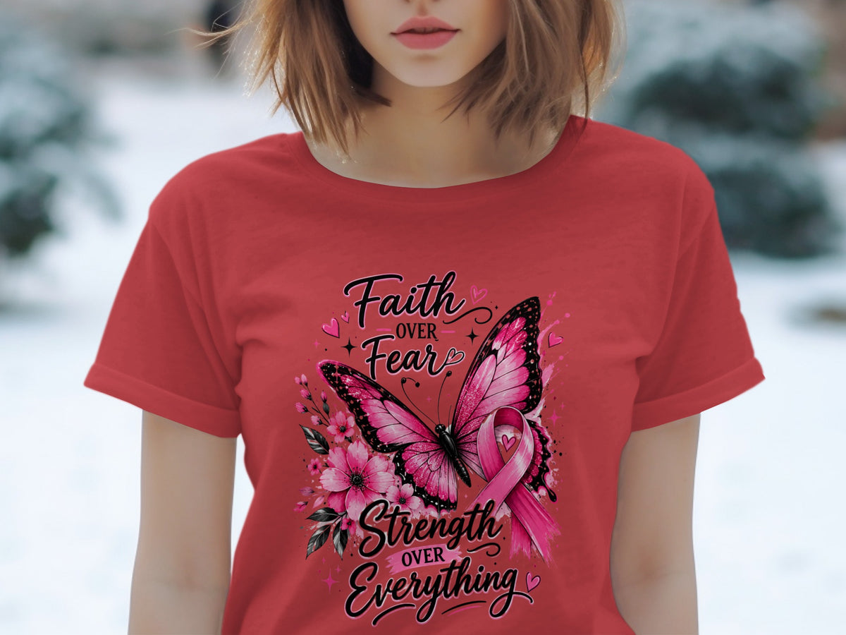 Red t-shirt with butterfly, flowers, and pink ribbon. Text: Faith over Fear, Strength over Everything.