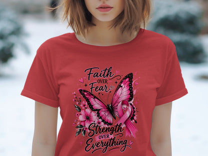 Red t-shirt with butterfly, flowers, and pink ribbon. Text: Faith over Fear, Strength over Everything.