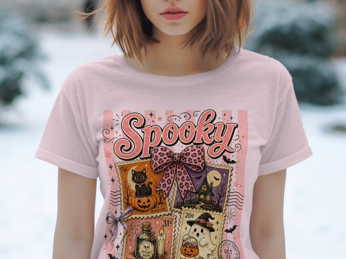 Pink t-shirt with "Spooky" and four Halloween-themed postage stamps.