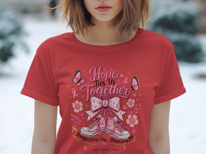 Red t-shirt with "Hope Ties Us Together" design, pink sneakers, butterflies, flowers, and ribbons.