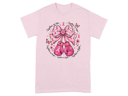 Pink t-shirt with bow, boxing gloves, ribbons, and text "Together we rise, hope, fight."