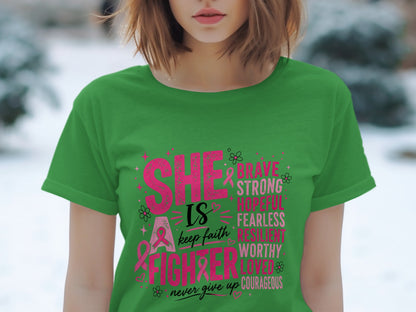 Green t-shirt with pink text "SHE IS A FIGHTER" and inspirational words.