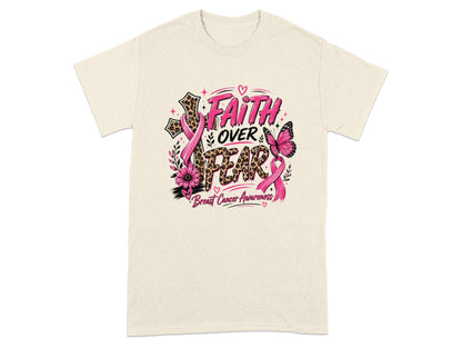 Cream t-shirt with "Faith Over Fear" graphic and breast cancer awareness ribbon.