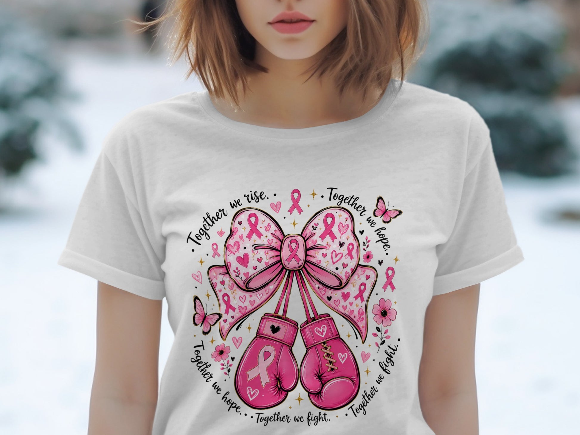 White t-shirt with pink boxing gloves, a bow, and breast cancer ribbons.
