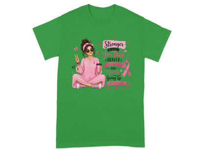 Green t-shirt with "Stronger Than You Think" breast cancer awareness graphic.