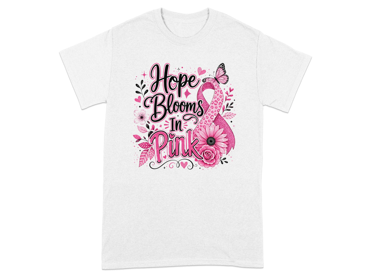 White t-shirt with "Hope Blooms In Pink" text and pink ribbon design.