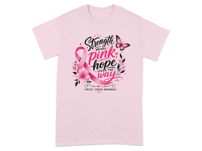 Pink t-shirt with breast cancer awareness graphic: "Strength wears pink, hope leads the way".