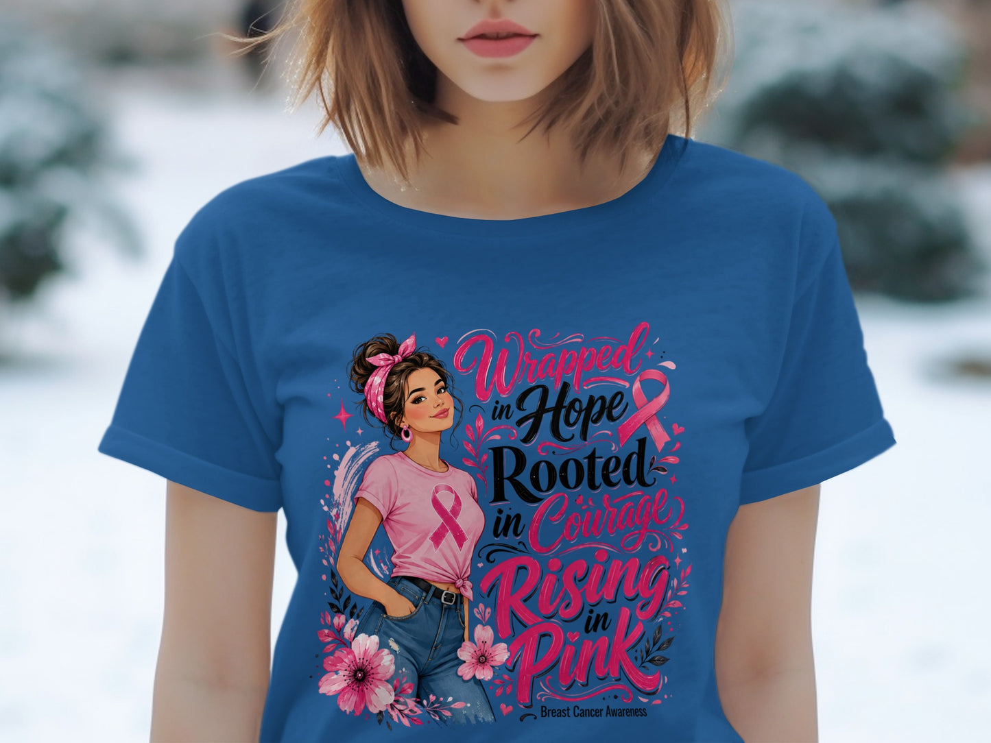 T-shirt with woman graphic and text: Wrapped in Hope, Rooted in Courage, Rising in Pink. Breast Cancer Awareness.